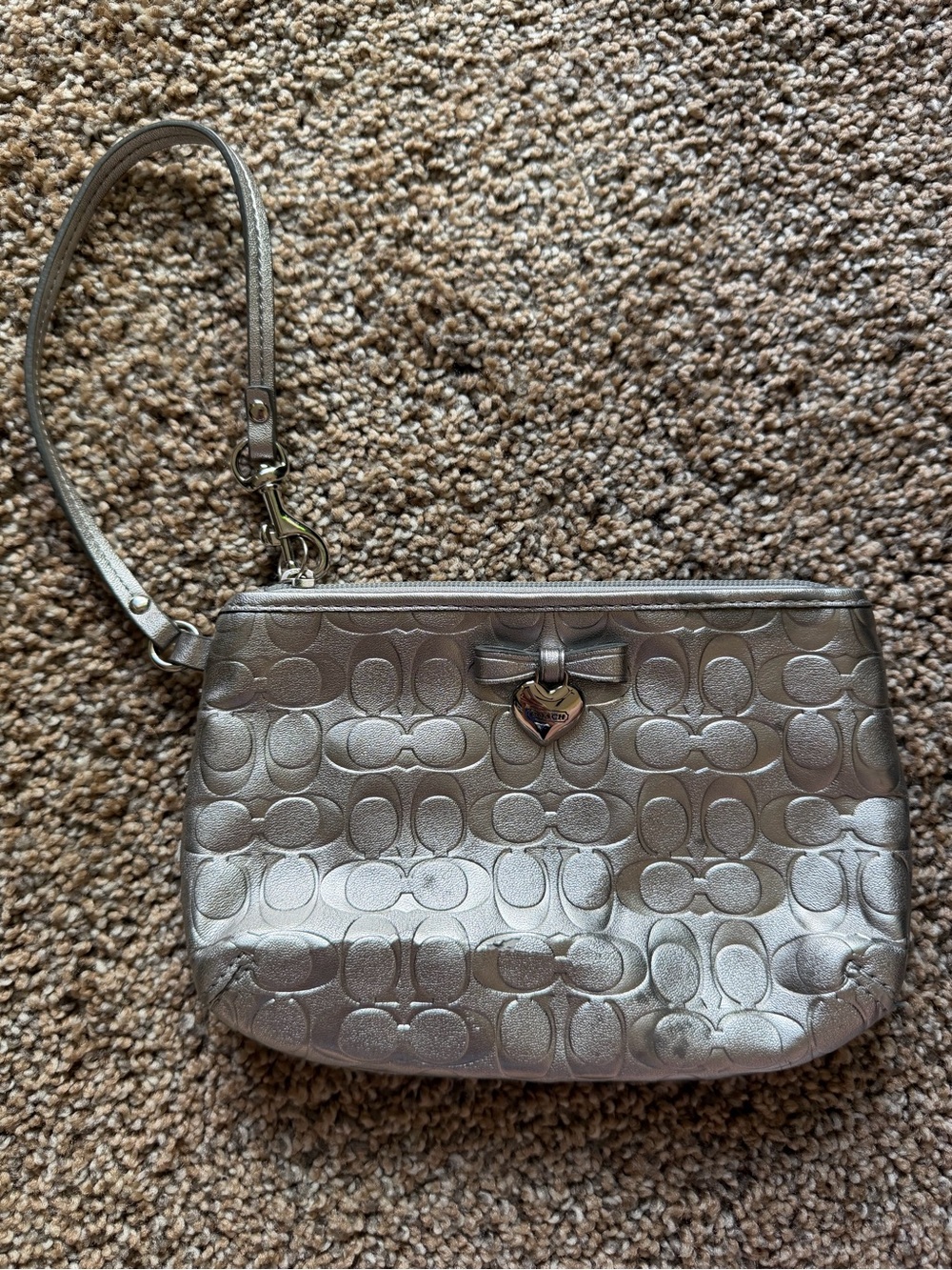 COACH Silver Signature C Embossed Wristlet Wallet